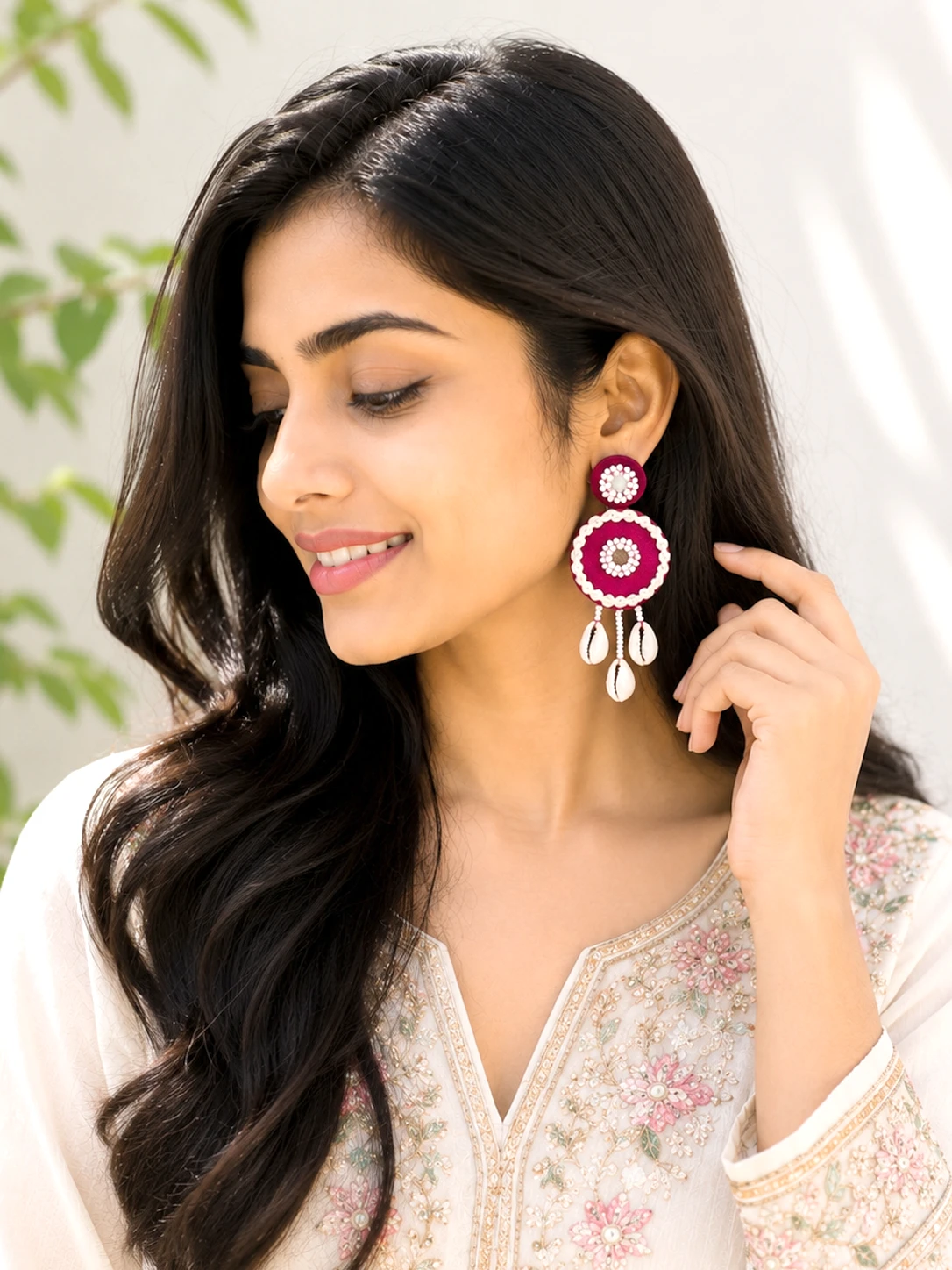 Handmade berry pink mirror shell earrings with mirror work, braided thread border and cowrie shell drops