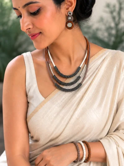 Handmade triple layer beaded necklace set with matching earrings and bangles in brown and ivory